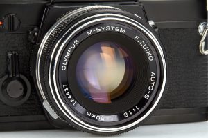 Olympus M1 black paint 1972 lens front