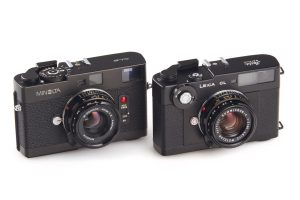 Leica CL vs Minolta CLE 1974 film rangefinder cameras